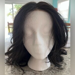 Raquel Welch off black wig